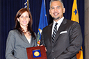 (L-R) Anna Tryon Pletcher and Albert Sambat accept a 2011 Assistant Attorney General Team Award for the California Real Estate Matters Team from the San Francisco Field Office and the Information Systems Support Group.