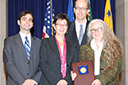 U.S. v. KeySpan Corp. Team members from the Transportation, Energy, and Agriculture Section and the Economic Analysis Group accept a 2011 Assistant Attorney General Team Award. (L-R) John Elias, Robin Allen, Oliver Richard, and Jade Eaton.