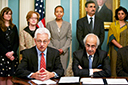 (Seated L-R) Acting Assistant Attorney General Joe Wayland and Chairman Ashok Chawla of the Competition Commission of India speak after signing the Memorandum of Understanding (MOU) on Antitrust Competition in September 2012. (Standing L-R) Department of State Deputy Assistant Secretary Alyssa Ayres; Department of Justice Special Advisor, International, Rachael Brandenburg; Department of Justice Deputy Assistant Attorney General Leslie Overton; Minister of Pers. and Community Affairs,  Embassy of India, Datta Padsalgikar; and Counselor, Economic, Embassy of India, Sukriti Likhi.