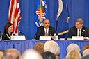 Assistant Attorney General Christine Varney, U.S. Attorney General Eric Holder, and Agriculture Secretary Tom Vilsack speak at the first joint DOJ/USDA agriculture workshop in Iowa.