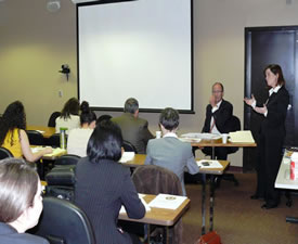 photograph of Assistant Attorney General Perez and U.S. Attorney McQuade meet with the Detroit Hispanic Development Corporation