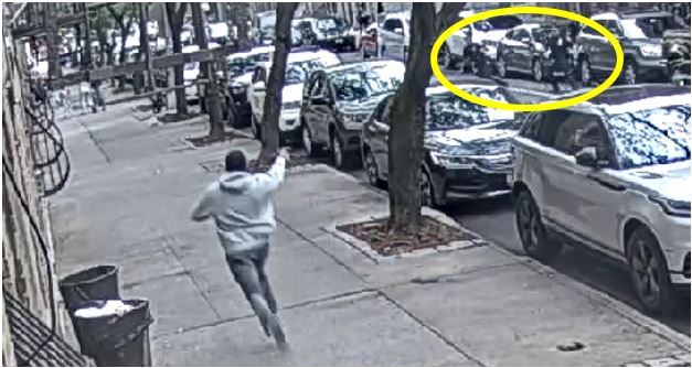 Picture of defendant shooting at NYPD officers