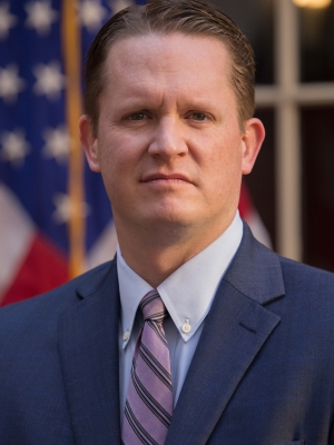 Acting US Attorney Daniel P. Bubar