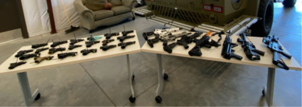 Guns seized on table