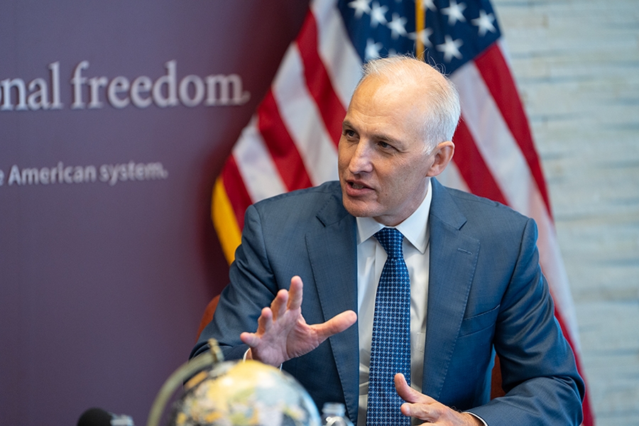 Assistant Attorney General Matthew G. Olsen speaks while seated during a Q&A at the Hoover Institution in Washington, D.C.