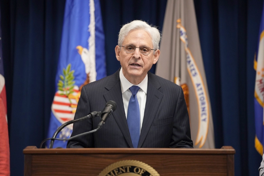 Attorney General Merrick B. Garland delivers remarks from a podium at the U.S. Attorney’s Office for the District of Minnesota.