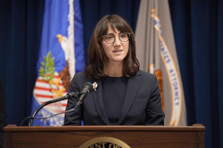 First Assistant U.S. Attorney Ann M. Bildtsen for the District of Minnesota delivers remarks from a podium at the U.S. Attorney’s Office for the District of Minnesota.