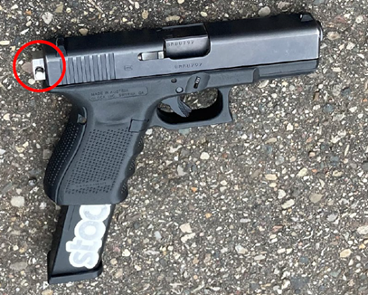 Image of the pistol fitted with a machinegun-conversion device, commonly known as a “switch.”