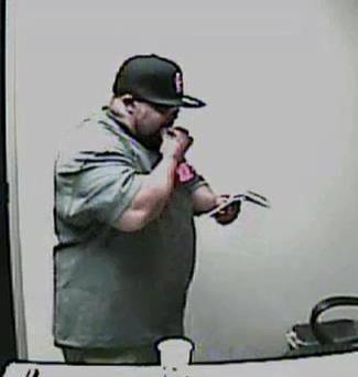 A still from a surveillance video showing Phillip Cutler.