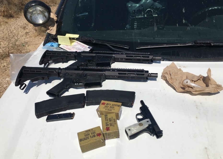 Two more AR-style rifles, a pistol, magazines, and Russian made ammunition. Notably, these were exchanged for drugs.