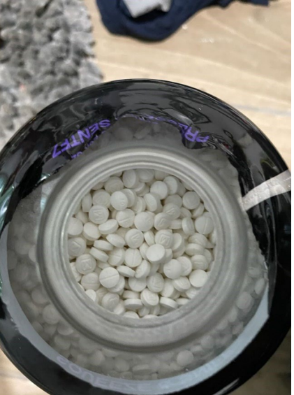 Aerial shot of fake oxy in downy unstopables container