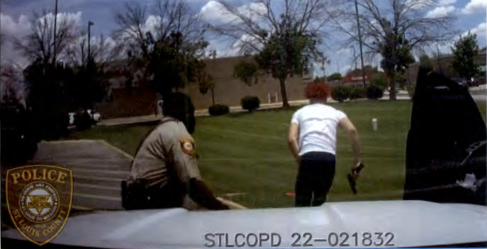 A screen shot of police car camera video of the arrest of Xavier Boyd.