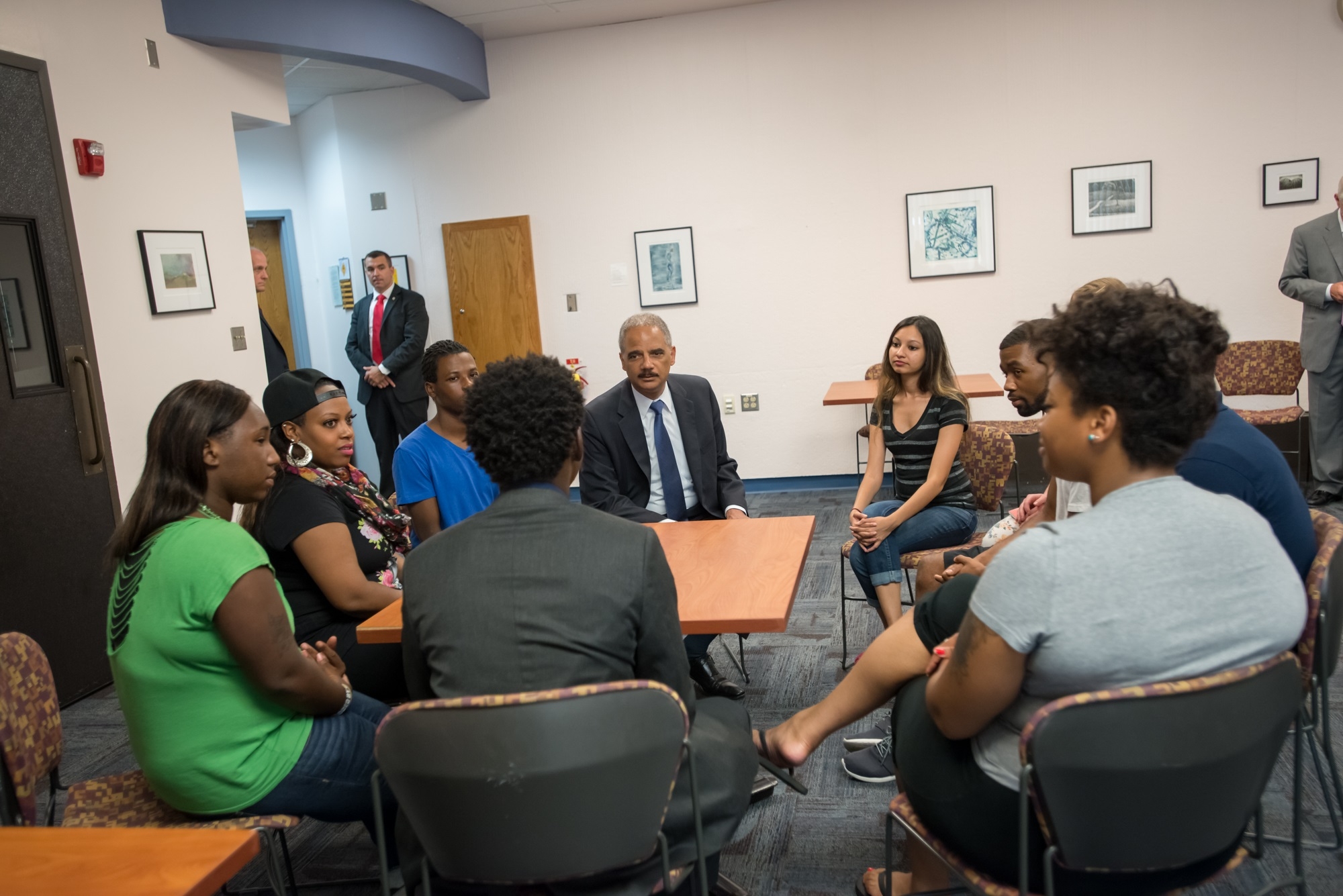 Attorney General Eric Holder meets with students at the Florissant Valley Community College in north St. Louis.