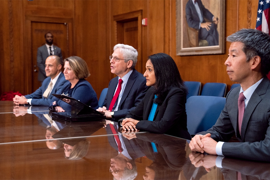 Attorney General Merrick B. Garland speaks among Justice Department officials in the Attorney General’s conference room