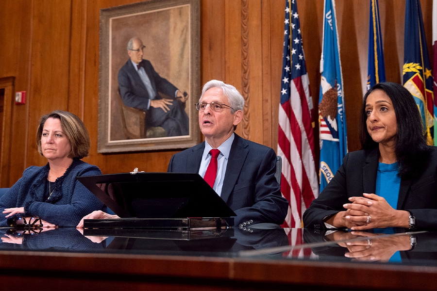 Attorney General Merrick B. Garland speaks among Justice Department officials in the Attorney General’s conference room