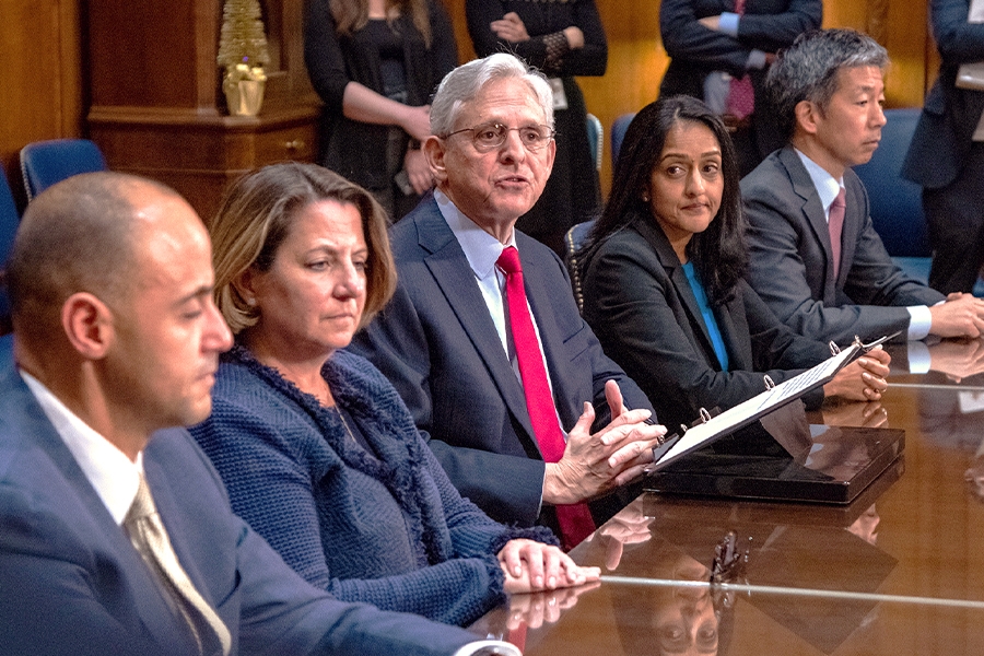 Attorney General Merrick B. Garland speaks among Justice Department officials in the Attorney General’s conference room