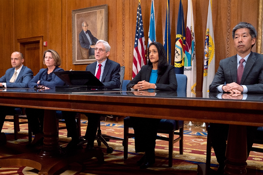 Attorney General Merrick B. Garland speaks among Justice Department officials in the Attorney General’s conference room