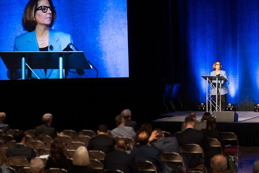 Deputy Attorney General Lisa O Monaco delivers remarks from a podium at the American Bar Association National Institute on White Collar Crime in Miami, Florida.