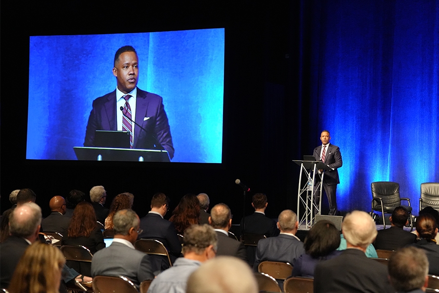 Assistant Attorney General for the Criminal Division Kenneth A. Polite, Jr. delivers remarks from a podium at the American Bar Association National Institute on White Collar Crime in Miami, Florida.