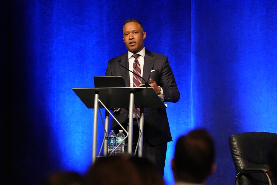 Assistant Attorney General for the Criminal Division Kenneth A. Polite, Jr. delivers remarks from a podium at the American Bar Association National Institute on White Collar Crime in Miami, Florida.