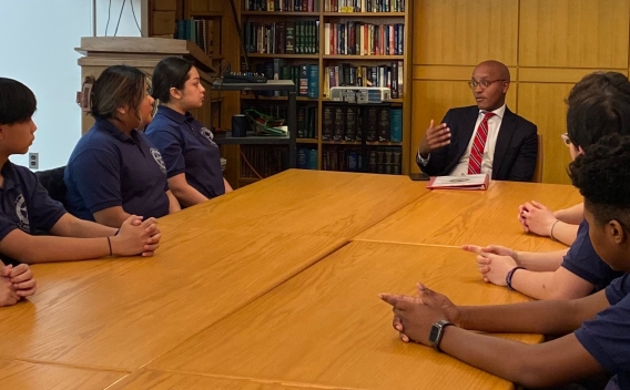 U.S. Attorney Damian Williams speaking with a group of USMS Explorers