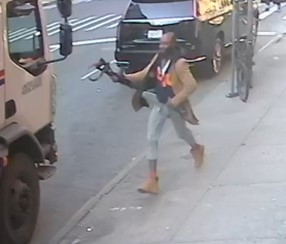Picture of the defendant holding a firearm Picture of the defendant holding a firearm