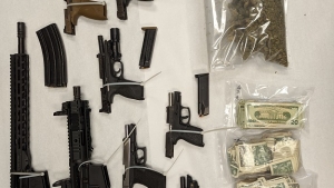 Guns, cash and marijuana seized