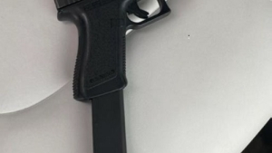 Gun with extended magazine