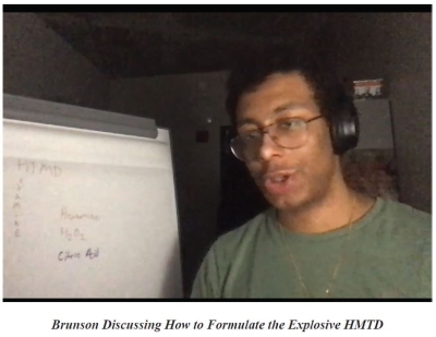 Screen grab of livestream showing man wearing headphones. Text reads: Brunson discussing how to formulate the explosive HMTD