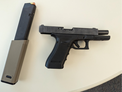 A black .40 caliber Glock and a high-capacity magazine