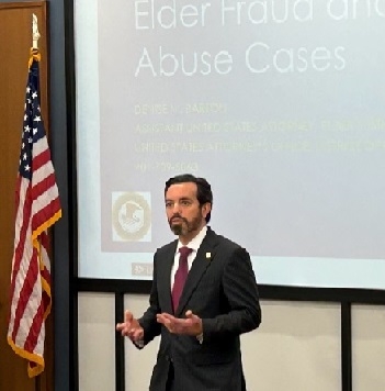 ​  United States Attorney Zachary A. Cunha welcomes attendees to the Elder Fraud Law Enforcement Investigation and Prosecution Training Program    ​