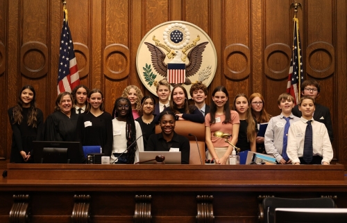 Nathan Bishop Middle School students, mentors, and District Court Judge Mary S. McElroy – participants in the Discovering Justice Program