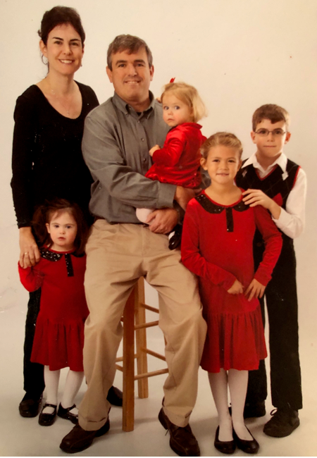 Miller family photo from right to left: Mother, Maggie, Father holding the baby sister, older sister and older brother. 