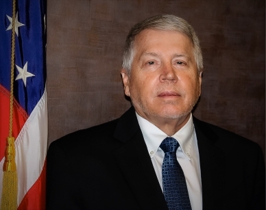 U.S. Attorney Dennis R. Holmes