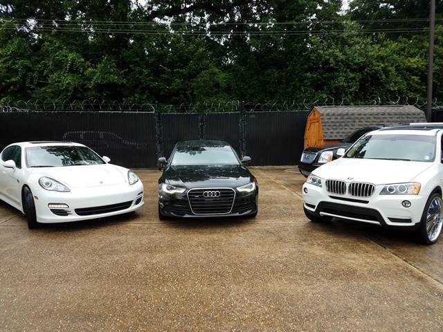 Luxury vehicles seized by a DEA Tactical Diversion Squad executing a search warrant. 