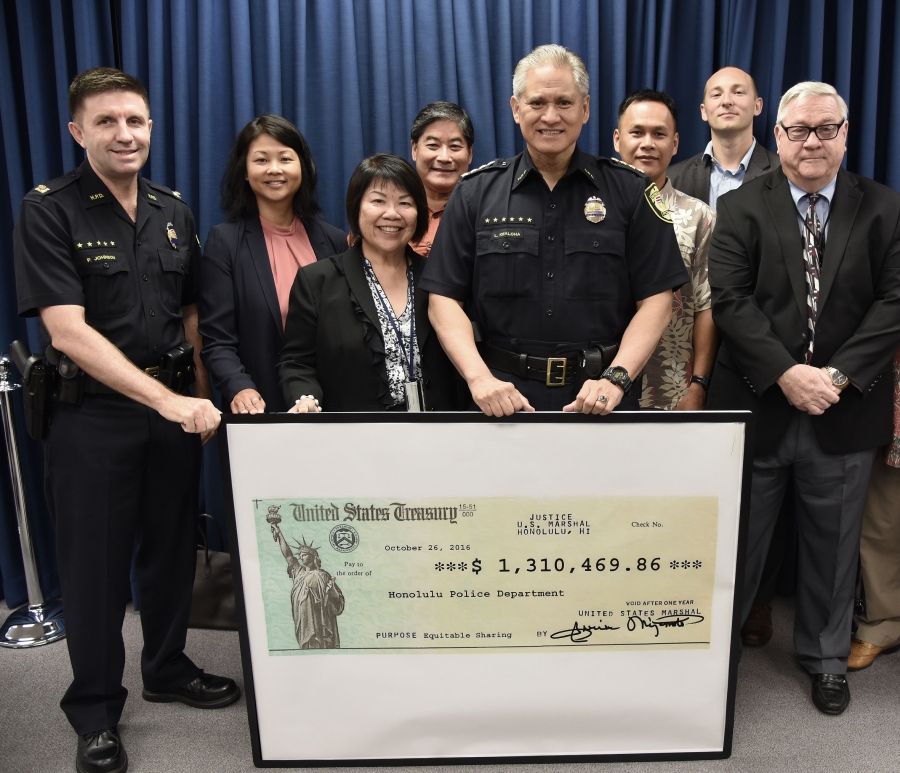 From Left to Right: HPD Vice Division Lt. Phillip Johnson, Homeland Security Investigations SAC Joanna Ip, US Attorney Flo Nakakuni, United States Marshal Gervin Miyamoto, HPD Chief Louis Kealoha, FBI SAC Tuan Nguyen, IRS Special Agent David Meisenheimer, AUSA Larry Butrick