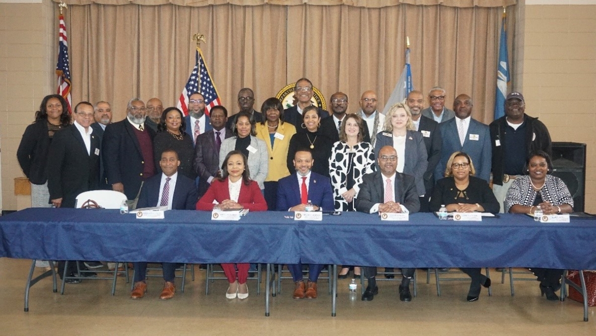 Assistant Attorney General Kristen Clarke (seated left center) with U.S. Attorney Brandon Brown (seated right center) with Civil Rights Division and Western District of Louisiana staff (seated) and Tallulah-Madison Parish community stakeholders (standing).