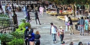 People reacting to man shooting gun in Savannah City Market