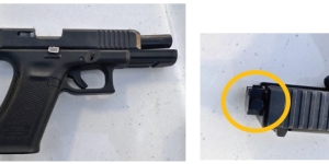 Black Glock pistol with black switch installed