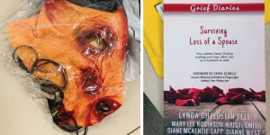 A bloody pig halloween mask and a book on surviving the loss of a spouse