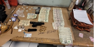 Drugs, gun, cash at arrest