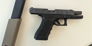 A black .40 caliber Glock and a high-capacity magazine