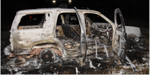 Image of the burned-out and abandoned car