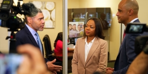 Assistant Attorney General Clarke and U.S. Attorney Graves meet with management at Industrial Bank.