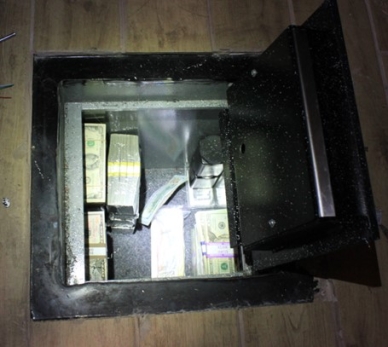 Picture of a safe with cash inside