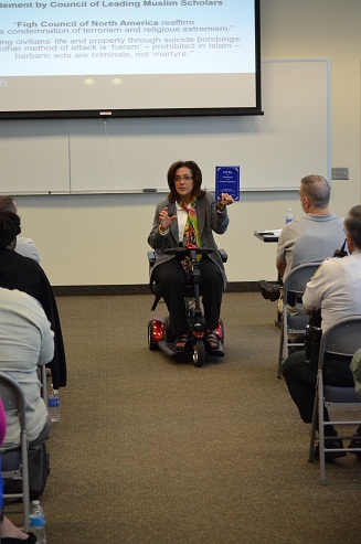 Connecting Cultures founder and president Lobna Ismail presenting during the seminar